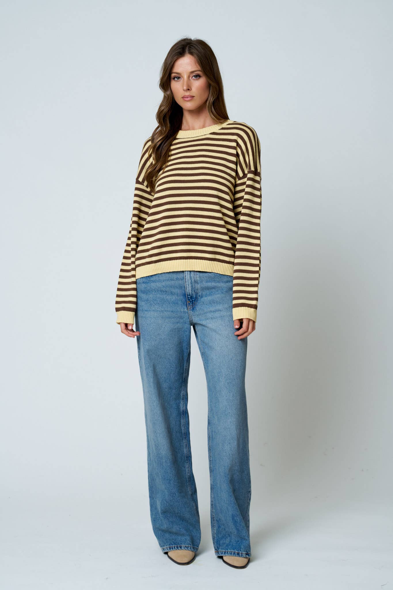 RELAXED BACK BUTTON KNIT SWEATER