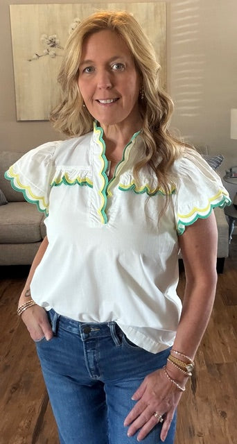 White scalloped blouse