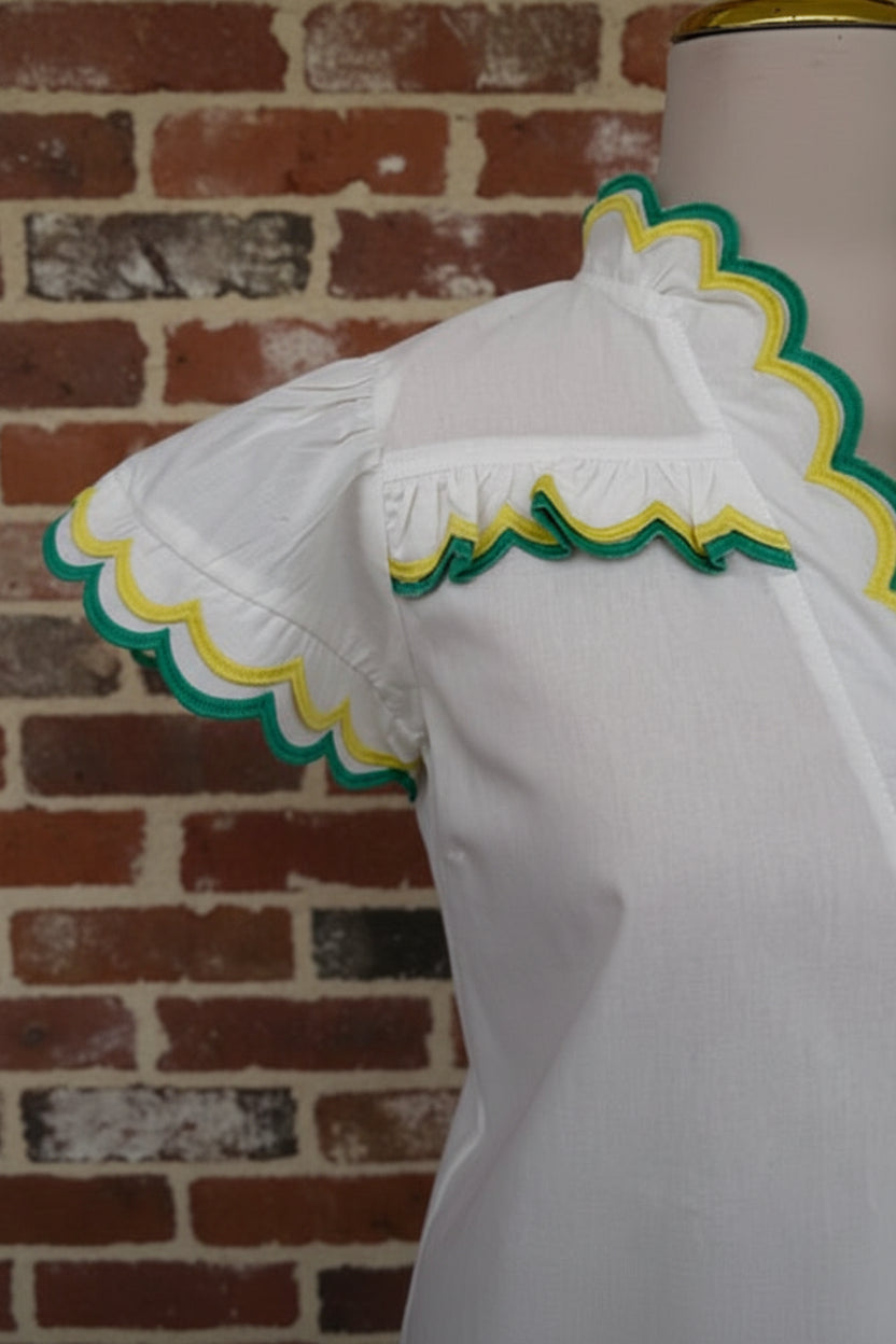 White scalloped blouse